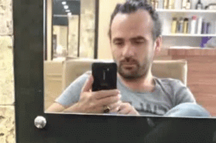 Checking Texting Image In Mirror GIF
