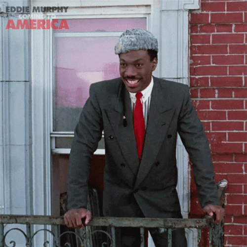 Cheerful Eddie Murphy On The Balcony GIF