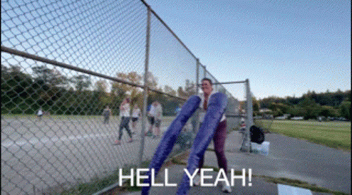 Cheering Into Kickball Field GIF