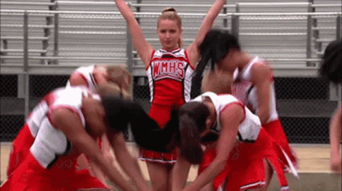 Cheerleader In WHHS Uniform Huddling GIF