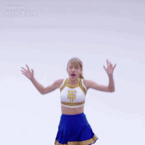 Cheerleader Jumping With Arms Outstretched