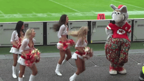 Cheerleaders Dancing in Front of Chiefs Mascot