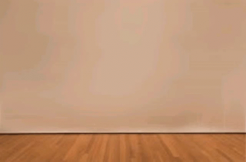 Cheerleaders Dancing in Front of Periodt Wall