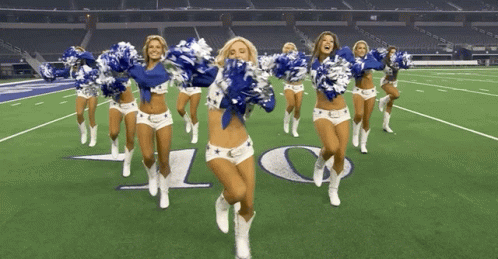 Cheerleaders Dancing On Field With Letter O GIF