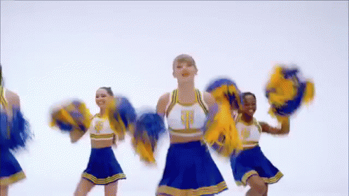 Cheerleaders in Blue and Yellow Holding Pom Poms