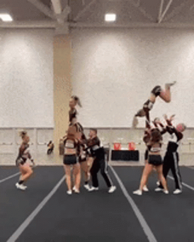 Cheerleaders Performing Stunt GIF