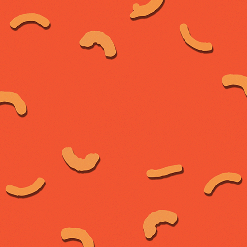 Cheese on Orange Background With Macaroni and Cheese