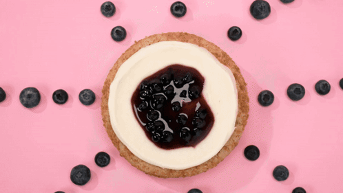 Cheesecake With Blueberries on Pink Surface