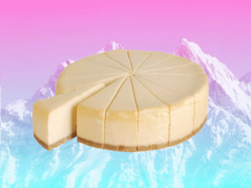 Cheesecake With Slice Taken Out on Mountain Background