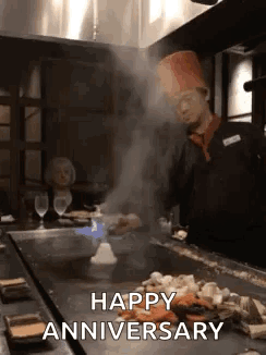 Chef Cooking on Grill Saying Happy Anniversary