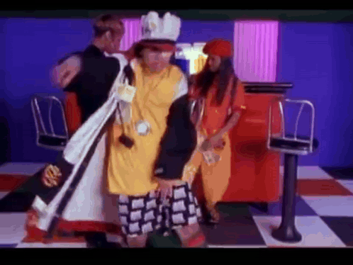 Chef Dancing With Two Women In Diner GIF