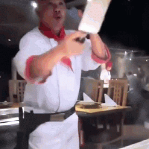 Chef Holding Large Knife