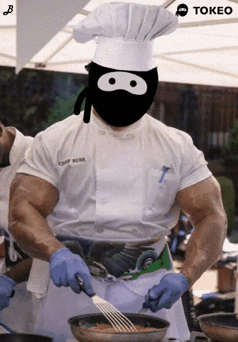 Chef in Mask and Hat Cooking