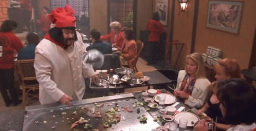 Chef Puts Hibachi On His Head GIF