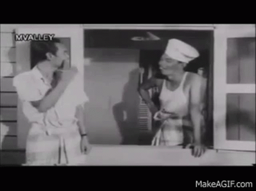 Chef Talking to Man in Black and White Kitchen