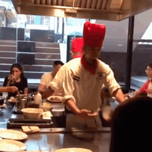 Chef with Red Hat Cooking