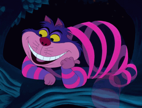 Cheshire Cat Smiling On Tree Branch GIF