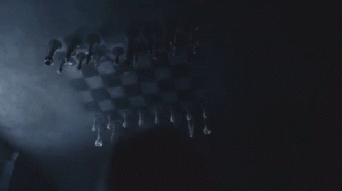 Chess Board With Pieces In Dark GIF