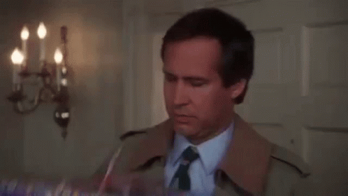 Chevy Chase Shaking Gift GIF
