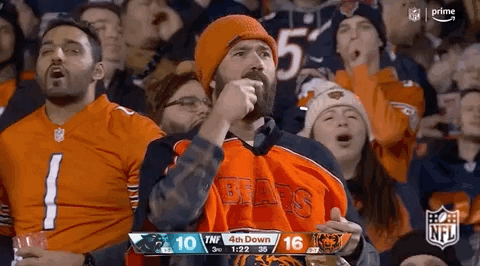Chicago Bear Fan Chewing Down Food GIF