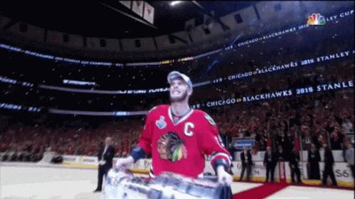 Chicago Blackhawks Jonathan Toews Raising Stanley Cup GIF