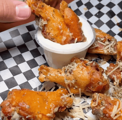Chicken Wing Being Dipped In A Ranch Sauce GIF