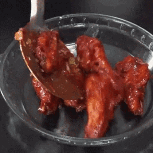 Chicken Wing Drizzled With Sesame Seeds GIF