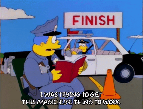 Chief Wiggum Watching The Finish Line GIF