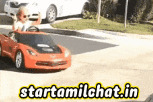 Child Driving Toy Car