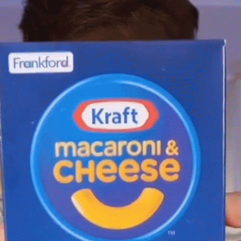 Child Holding Kraft Macaroni and Cheese