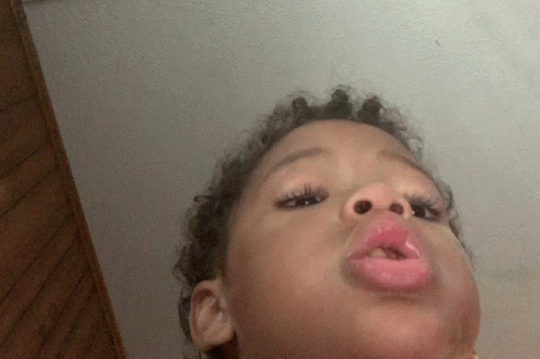Child Making Funny Face GIF