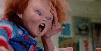Child's Doll Mouth Open Hand On Head GIF