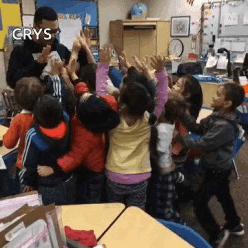 Children High Fiving Classroom Crys