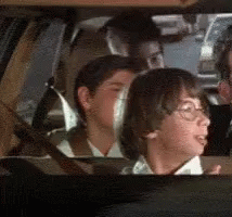 Children Looking Out Car Window GIF