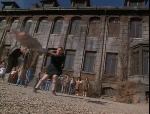 Children Playing in Front of Old Building