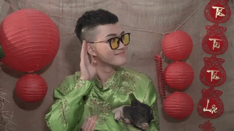 Chinese Le Thien Hieu Holding His Pet Pig GIF