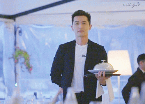 Chinese Hu Ge Serving While Smiling GIF