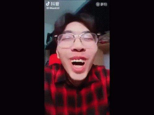 Crazy Chinese Guy Laughing GIF