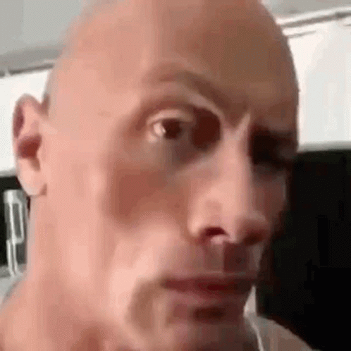 Chinese Guy Doing The Rock Eyebrow Meme GIF