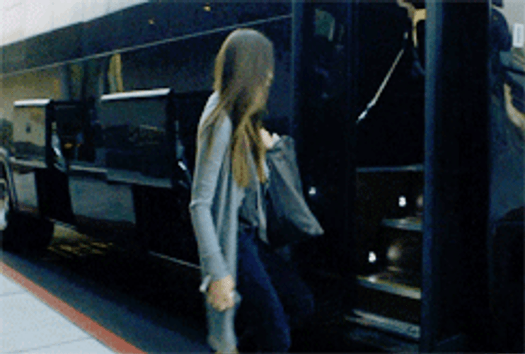 Chloe Bennet Riding A Bus GIF
