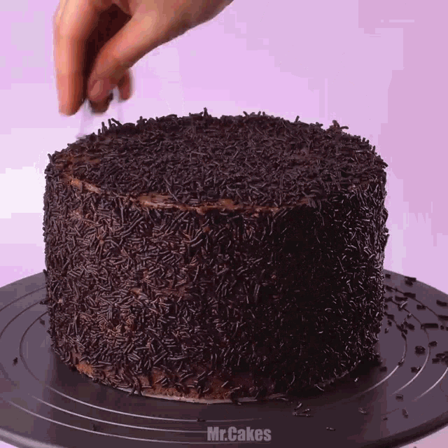 Chocolate Balls Topped Cake GIF