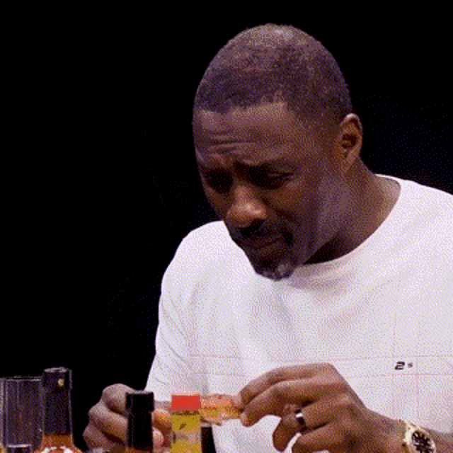 Choking Spicy Idris Elba GIF
