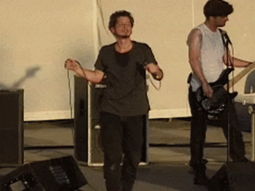 Chris Cornell Mike Mic Drop GIF