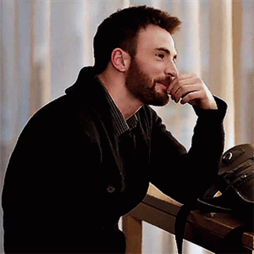 Chris Evans Thinking & Smiling GIF