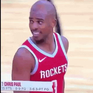 Chris Paul in Red Rockets Jersey Smiling