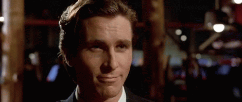 Christian Bale American Psycho Mocking Smile GIF
