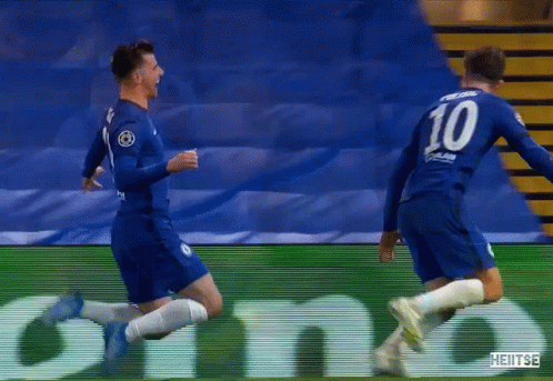 Christian Pulisic Slide Hugging Teammate GIF