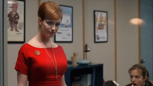 Christina Hendricks In A Sexy Red Elegant Dress GIF