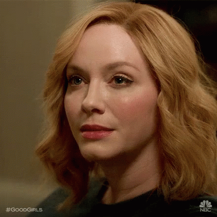 Christina Hendricks Is Sadly Shaking Her Head GIF