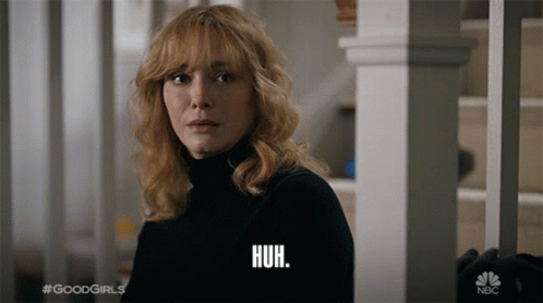Christina Hendricks Saying Huh While Blinking GIF